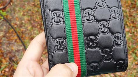 gucci wallet with metal tag fake|real gucci men's wallet.